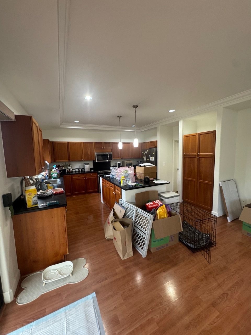 Closed kitchen with dark counters, before