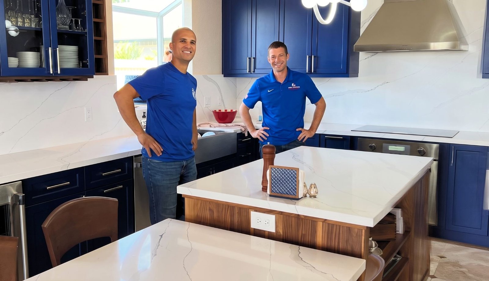 Sean and Henry on site in a finished client kitchen